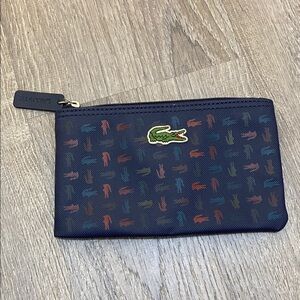 LACOSTE • zipper bag 5” X 8”